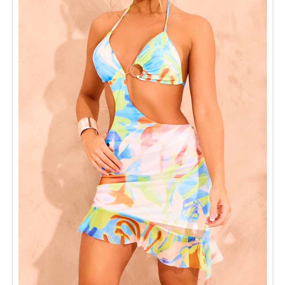 PrettyLittleThing Green Asymmetric Cut Out Ring Detail Ruffle Mini Dress